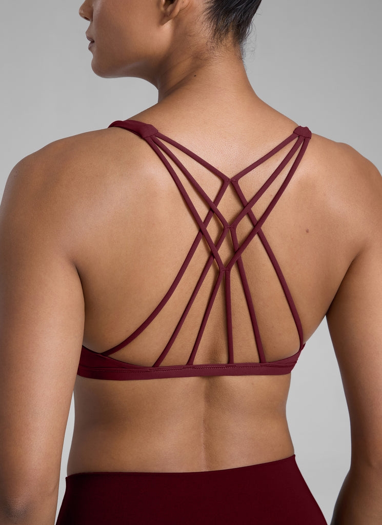 CRZ YOGA Women's Yoga Train Light Support Nakedfeel Strappy Bra Red Merlot