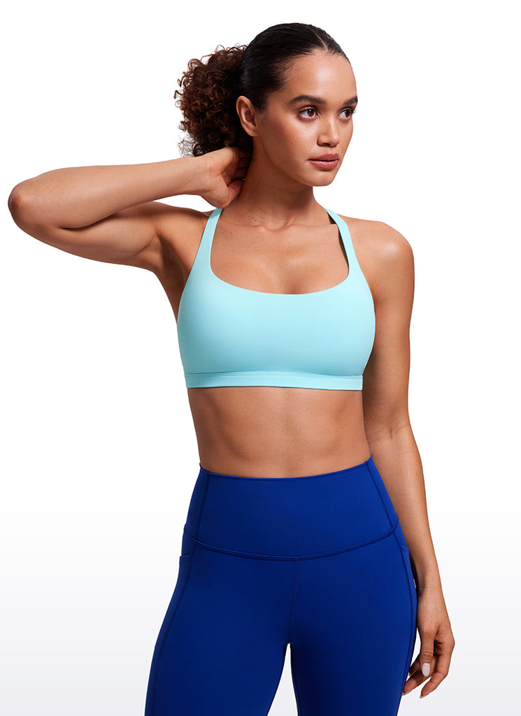 CRZ YOGA Women's Yoga Light Support Nakedfeel Strappy Bra Low Cut Hydra Blue