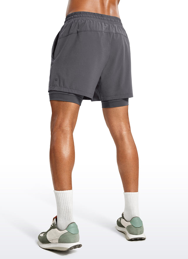 CRZ YOGA Men's Train Relaxed Fit Feathery-Fit 2 in 1 Shorts 5'' with Long Liner Dark Carbon