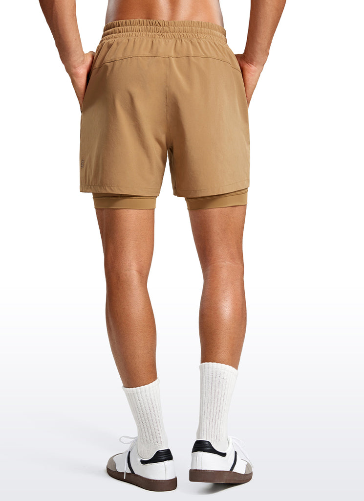 CRZ YOGA Men's Train Relaxed Fit Feathery-Fit 2 in 1 Shorts 5'' with Long Liner Khaki Sand