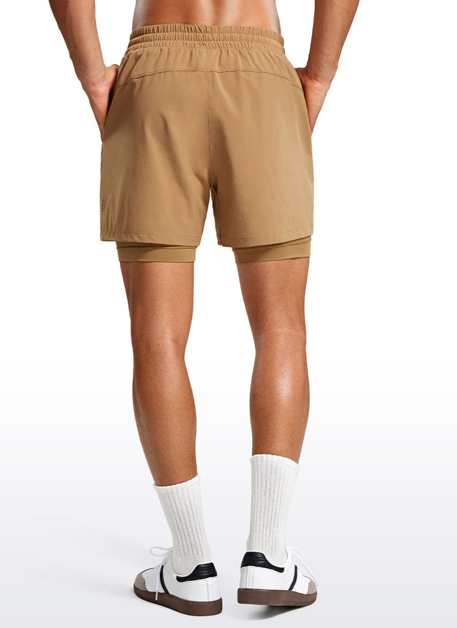 CRZ YOGA Men's Train Relaxed Fit Feathery-Fit 2 in 1 Shorts 5'' with Long Liner Khaki Sand