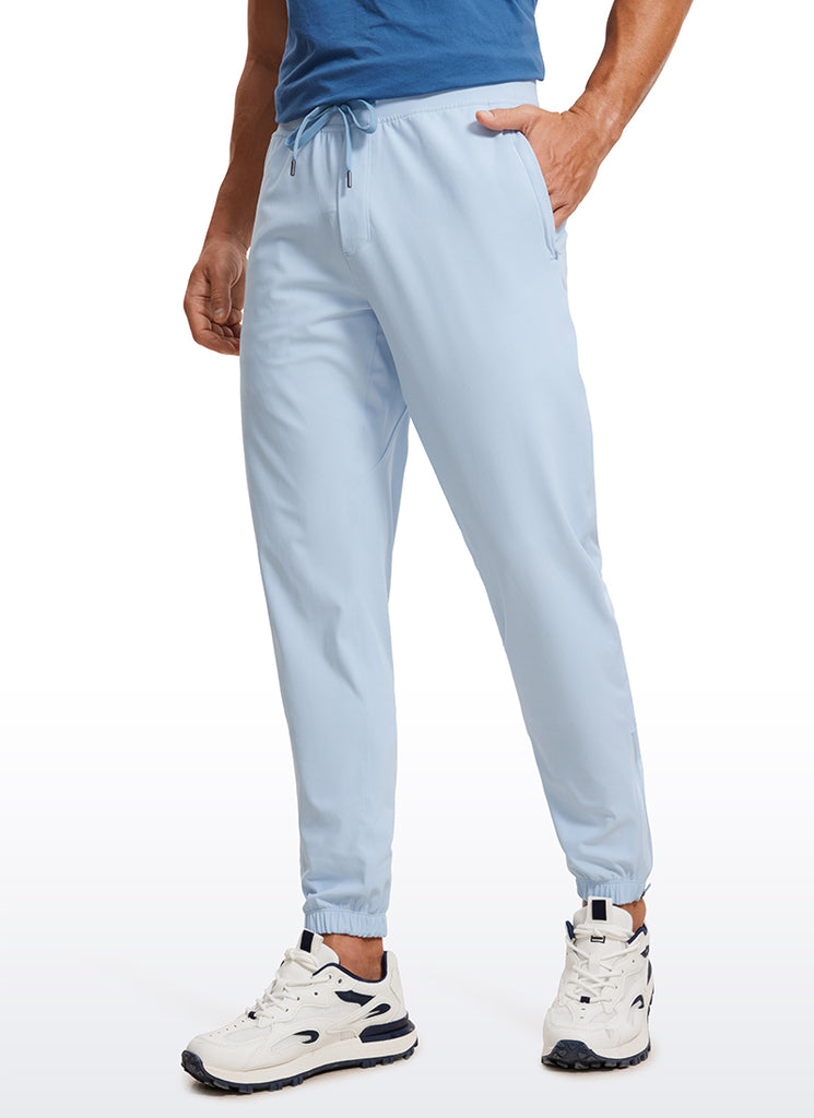 CRZ YOGA Men's Run Slim Fit On the Travel Joggers 30''- Ankle Zipper Chambray Blue