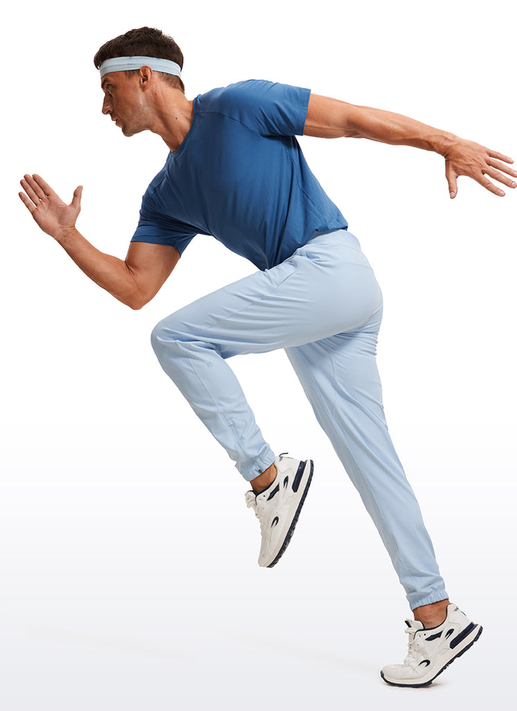 CRZ YOGA Men's Run Slim Fit On the Travel Joggers 30''- Ankle Zipper Chambray Blue