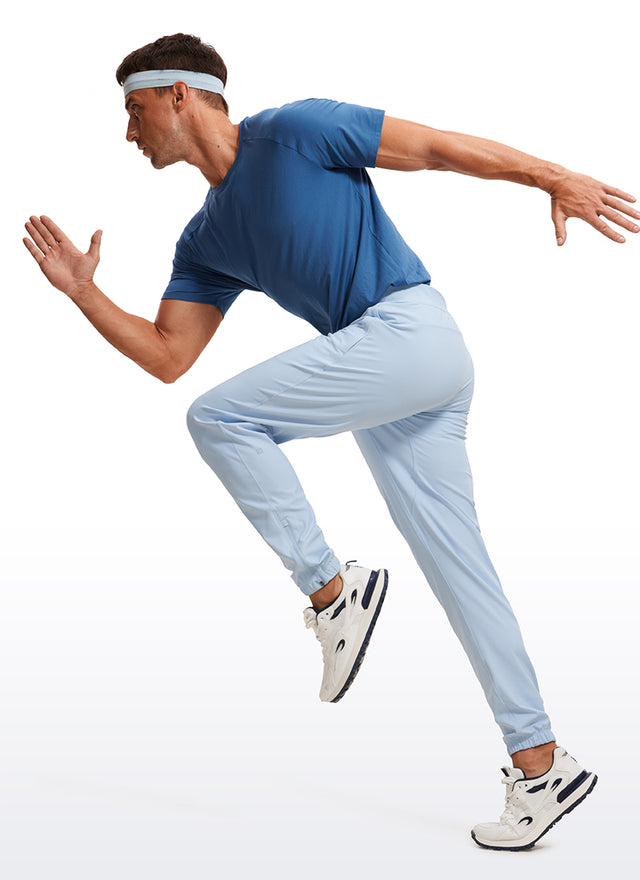 CRZ YOGA Men's Run Slim Fit On the Travel Joggers 30''- Ankle Zipper Chambray Blue