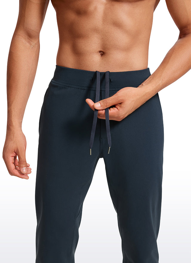 CRZ YOGA Men's Run Slim Fit On the Travel Joggers 30''- Ankle Zipper True Navy