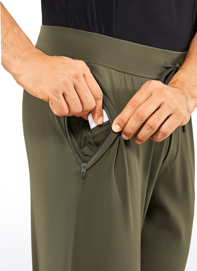 CRZ YOGA Men's Run Slim Fit On the Travel Joggers 30''- Ankle Zipper True Navy