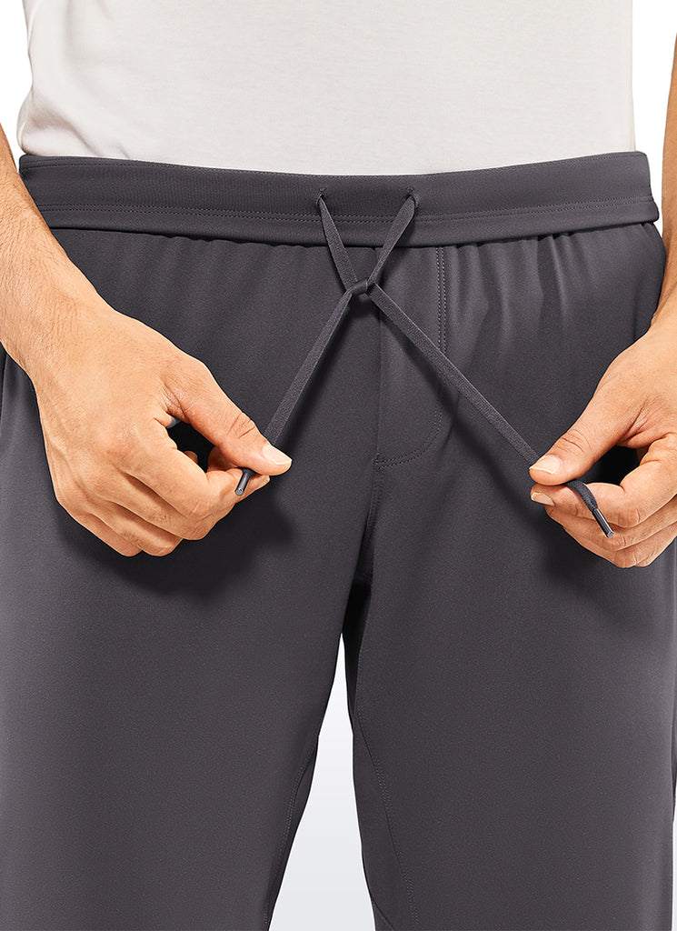 CRZ YOGA Men's Run Slim Fit On the Travel Joggers 30''- Ankle Zipper Ink Gray