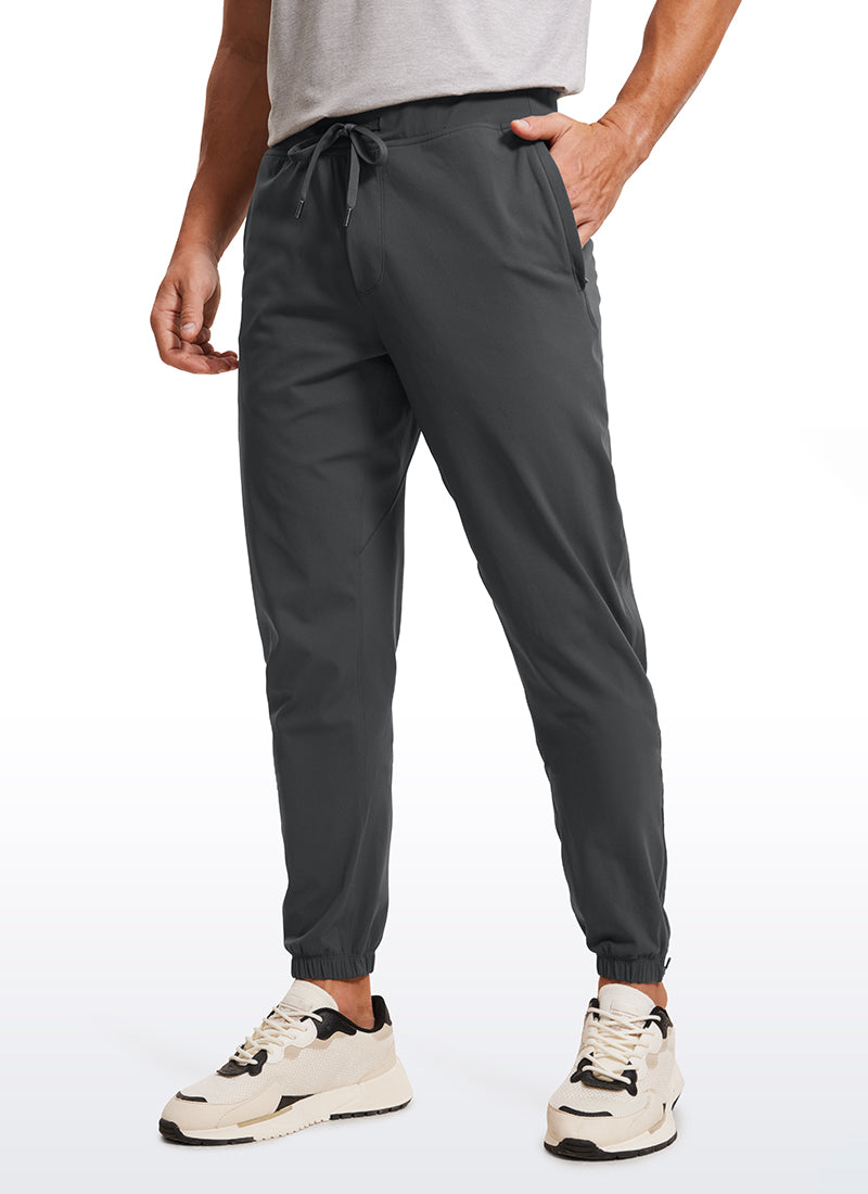 CRZ YOGA Men's Run Slim Fit On the Travel Joggers 32''- Ankle Zipper Melanite