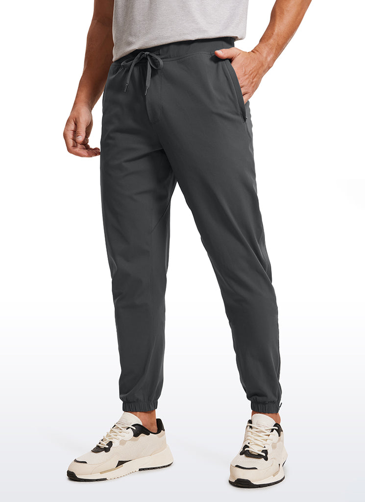 CRZ YOGA Men's Run Slim Fit On the Travel Joggers 32''- Ankle Zipper Melanite