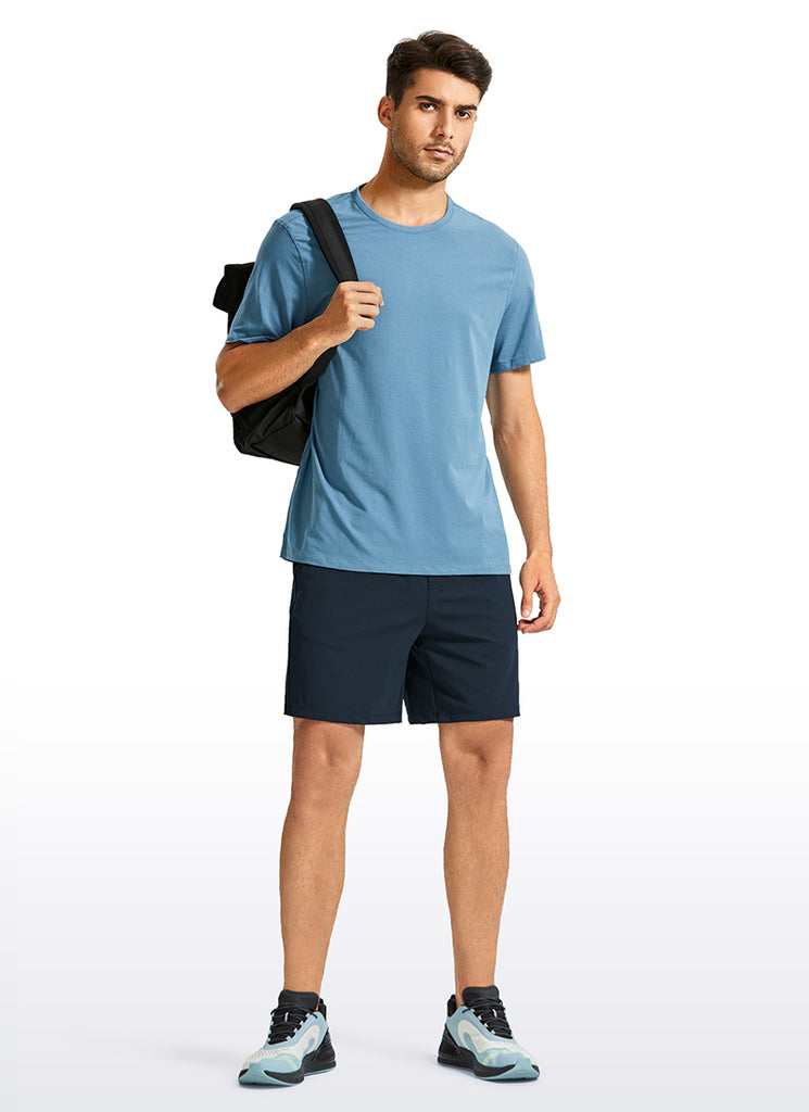 CRZ YOGA Men's Train Relaxed Fit On the Travel Linerless Shorts 7'' True Navy