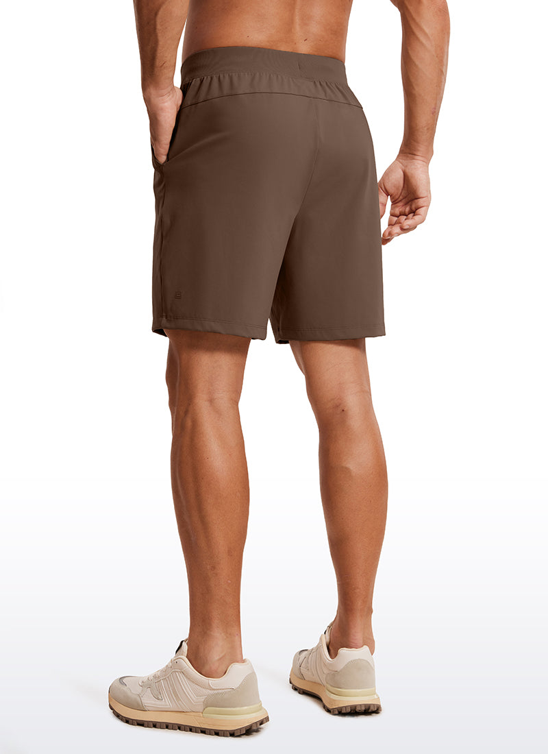 CRZ YOGA Men's Train Relaxed Fit On the Travel Linerless Shorts 7'' Dark Olive Brown