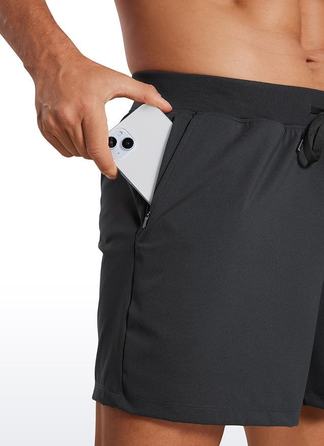 CRZ YOGA Men's Train Relaxed Fit On the Travel Linerless Shorts 5'' Ink Gray