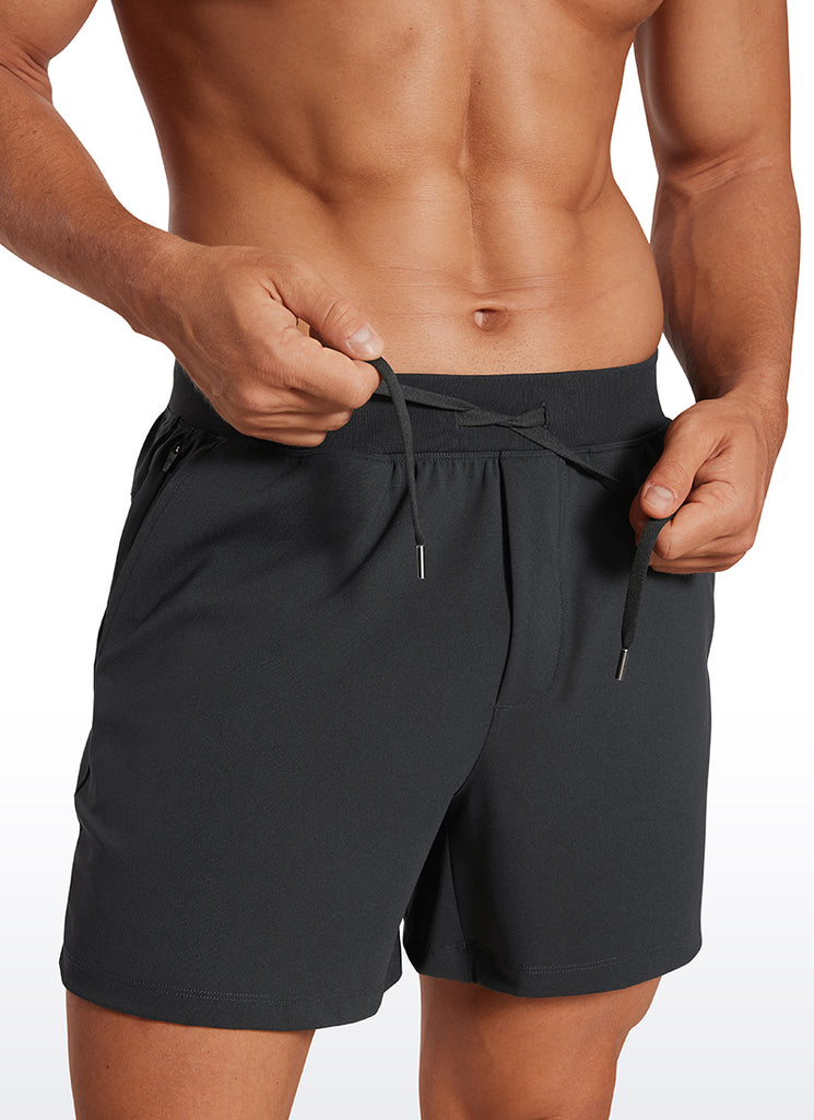 CRZ YOGA Men's Train Relaxed Fit On the Travel Linerless Shorts 5'' True Navy