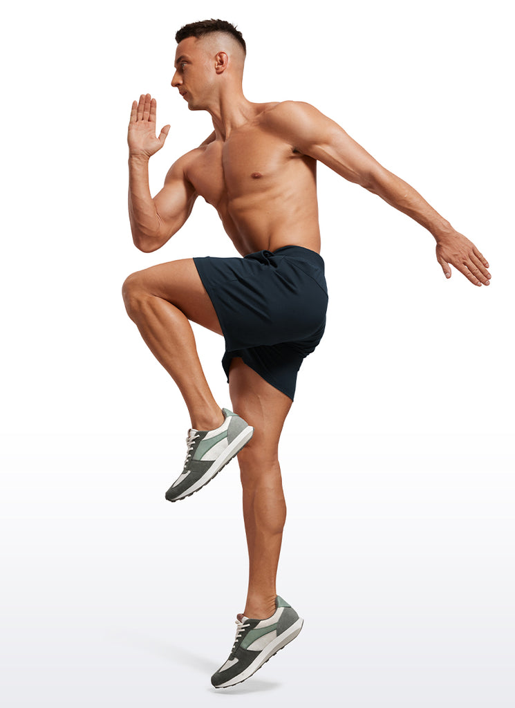 CRZ YOGA Men's Train Relaxed Fit On the Travel Linerless Shorts 5'' True Navy