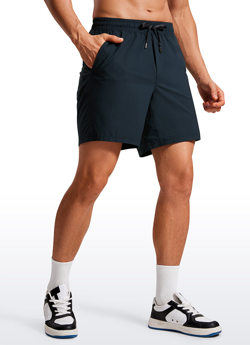 CRZ YOGA Men's Training Quick Dry Pocketed Linerless Shorts 7'' Melanite