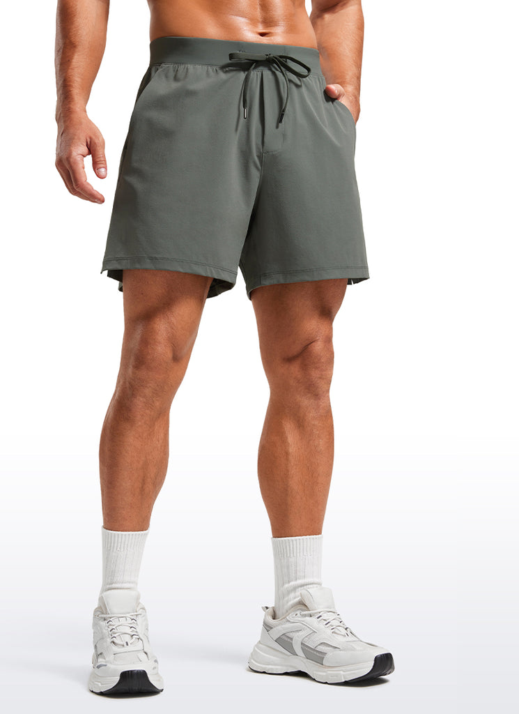 CRZ YOGA Men's Quick Dry Lightweight Gym Shorts with Zipper Pocket Stelindigo