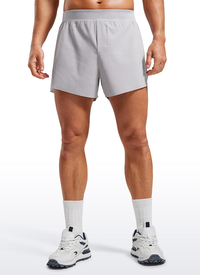 CRZ YOGA Men's 2 in 1 Running Dolphin Quick Dry Zip Pocket Shorts