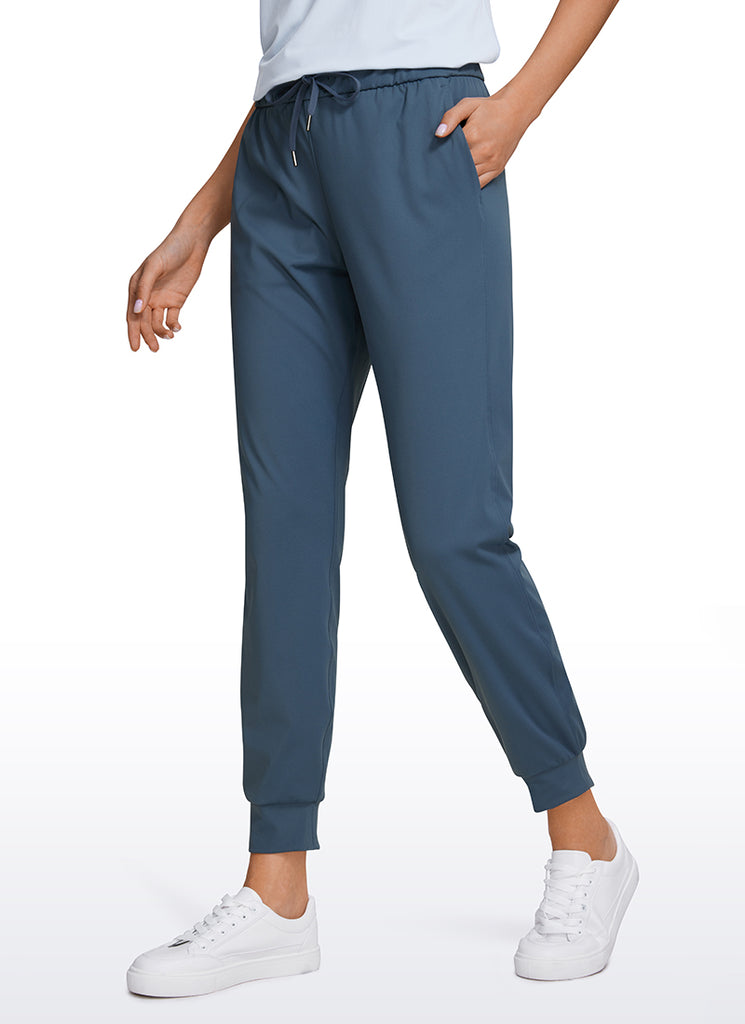 CRZ YOGA Women's Travel Slim Fit Stretch Drawstring Jogger 27'' Ink Gray