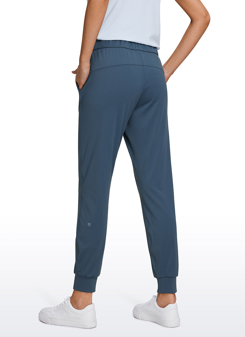 CRZ YOGA Women's Travel Slim Fit Stretch Drawstring Jogger 27'' Slate Blue