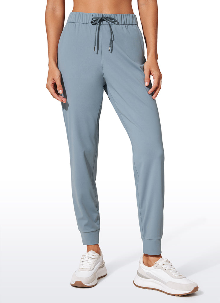 CRZ YOGA Women's Travel Slim Fit Stretch Drawstring Jogger 27'' Belgian Blue