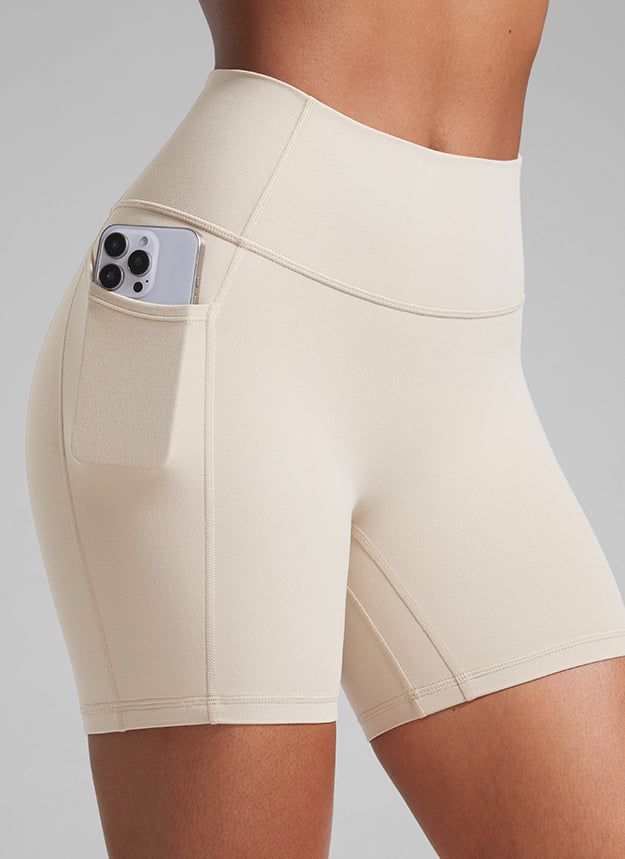 CRZ YOGA Butterlift Womens Scrunch Butt No Front Seam Pocket Biker Shorts 5'' Mojave Tan