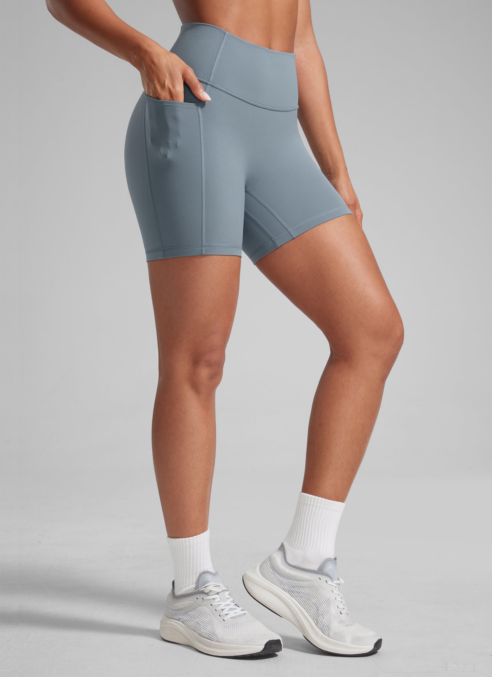 CRZ YOGA Butterlift Womens Scrunch Butt No Front Seam Pocket Biker Shorts 5'' Mojave Tan
