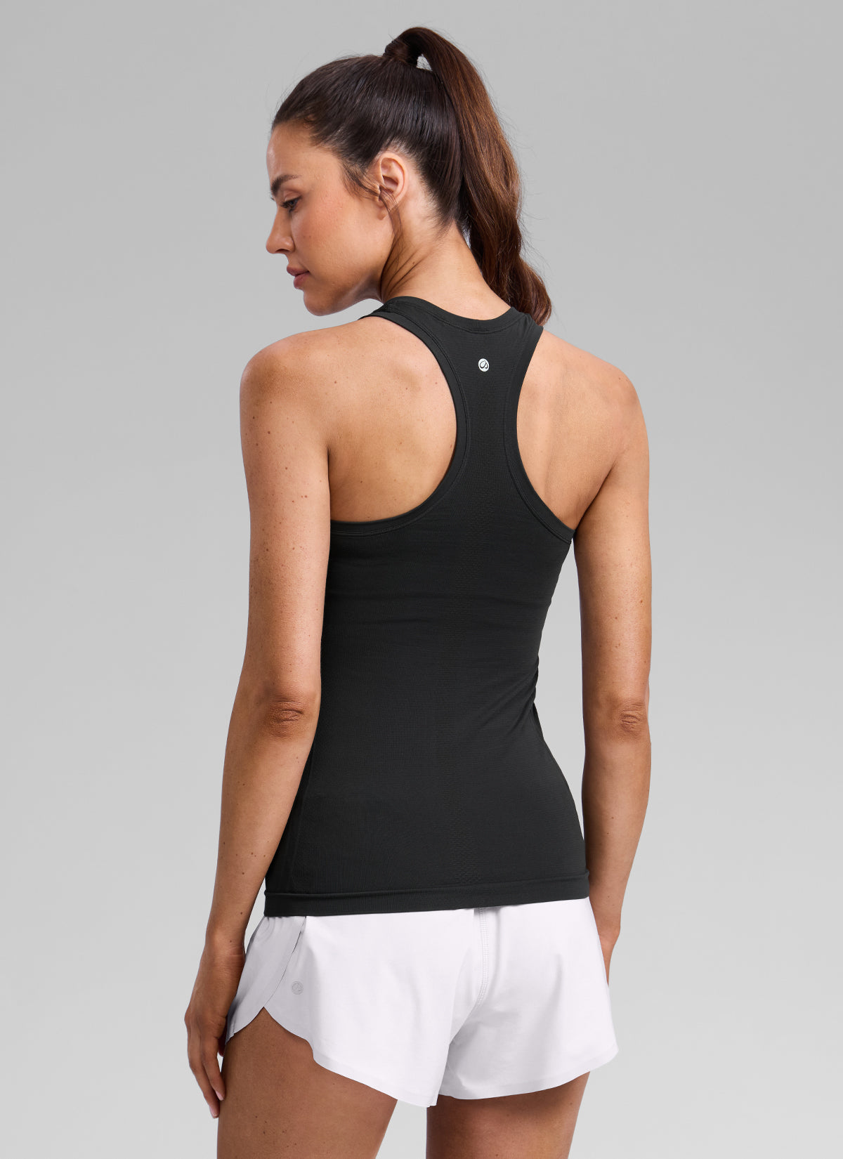 CRZ YOGA Women's Seamless Running Crewneck Racerback Hip Length Tank Black @model_info:Kseniia