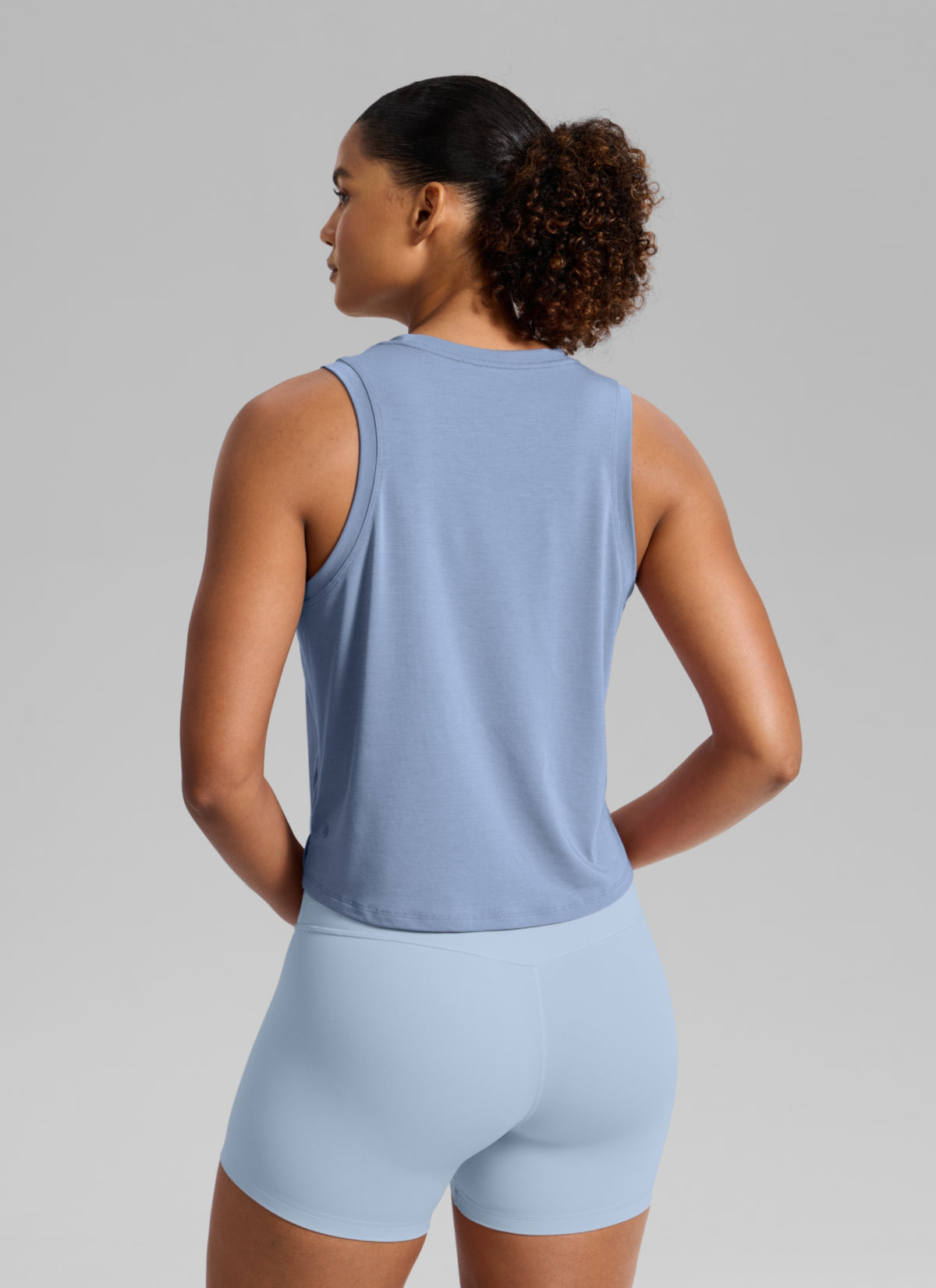 CRZ YOGA Women's Quick Dry Crop Racerback Sleevesless Tank Tops Washed Denim @model_info:B