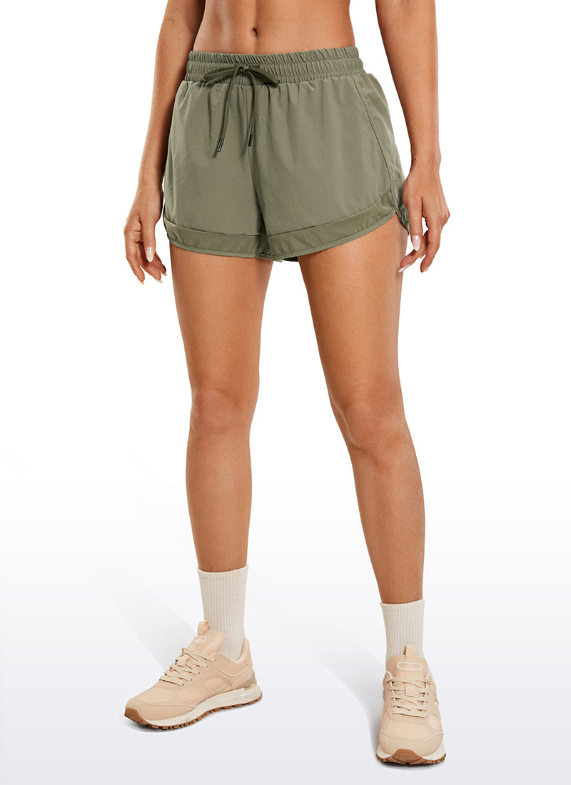 CRZ YOGA Women's Run Feathery-Fit Mid-Rise Lined Shorts Zip Pocket 3'' Mountain Olive