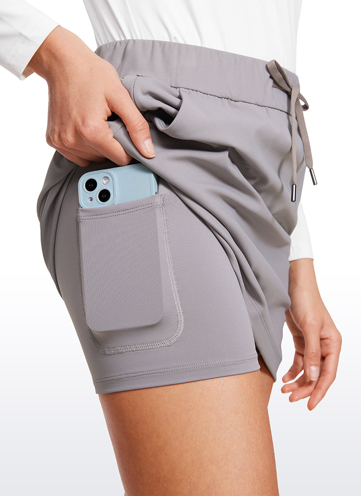 CRZ YOGA Women's Casual Golf Stretch High-Rise Drawstring Skirts 15" Dark Chrome