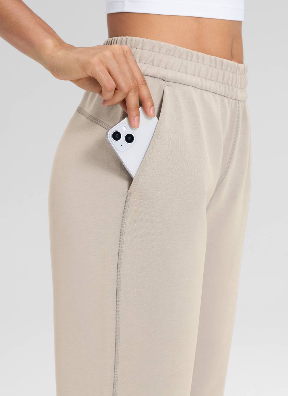 CRZ YOGA Women's SoftAura High Rise Wide Leg Pants with Pockets 31'' Mojave Tan @model_info:Larissa