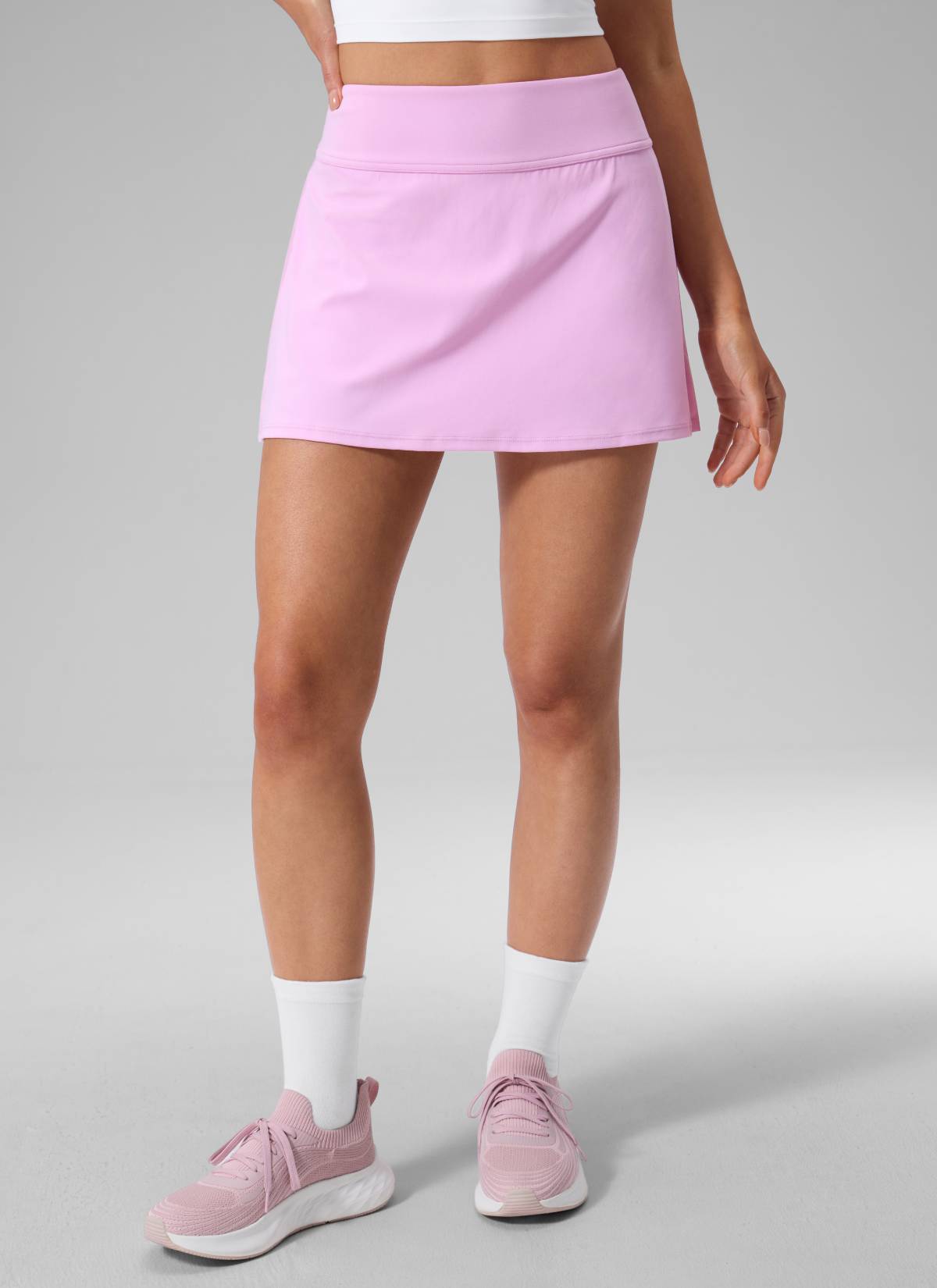CRZ YOGA Women's Dual-fabric Tennis Pocket Pleated Back Mini Skirt Vita Pink