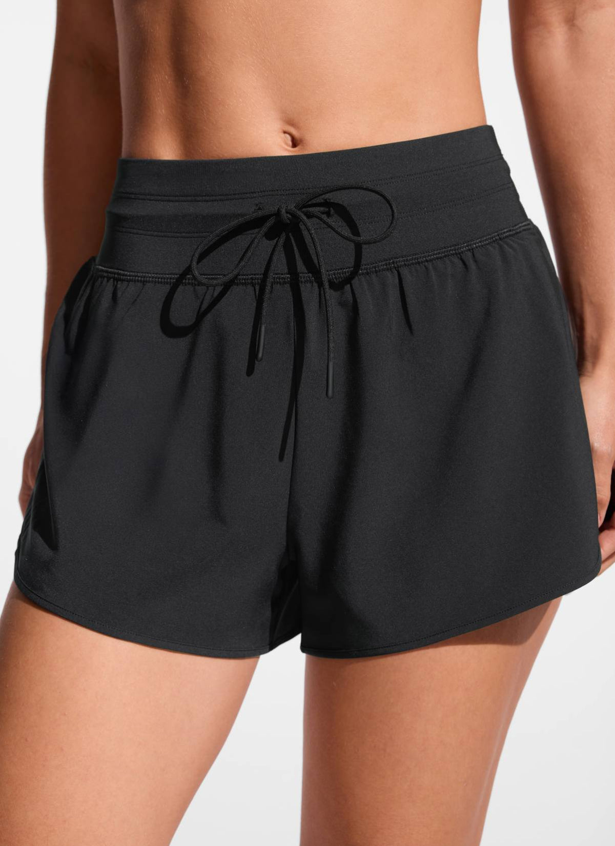 CRZ YOGA Women's Swimwear Feathery-Fit Split Dolphin Swim Shorts 2.5'' Black @model_info:Aline