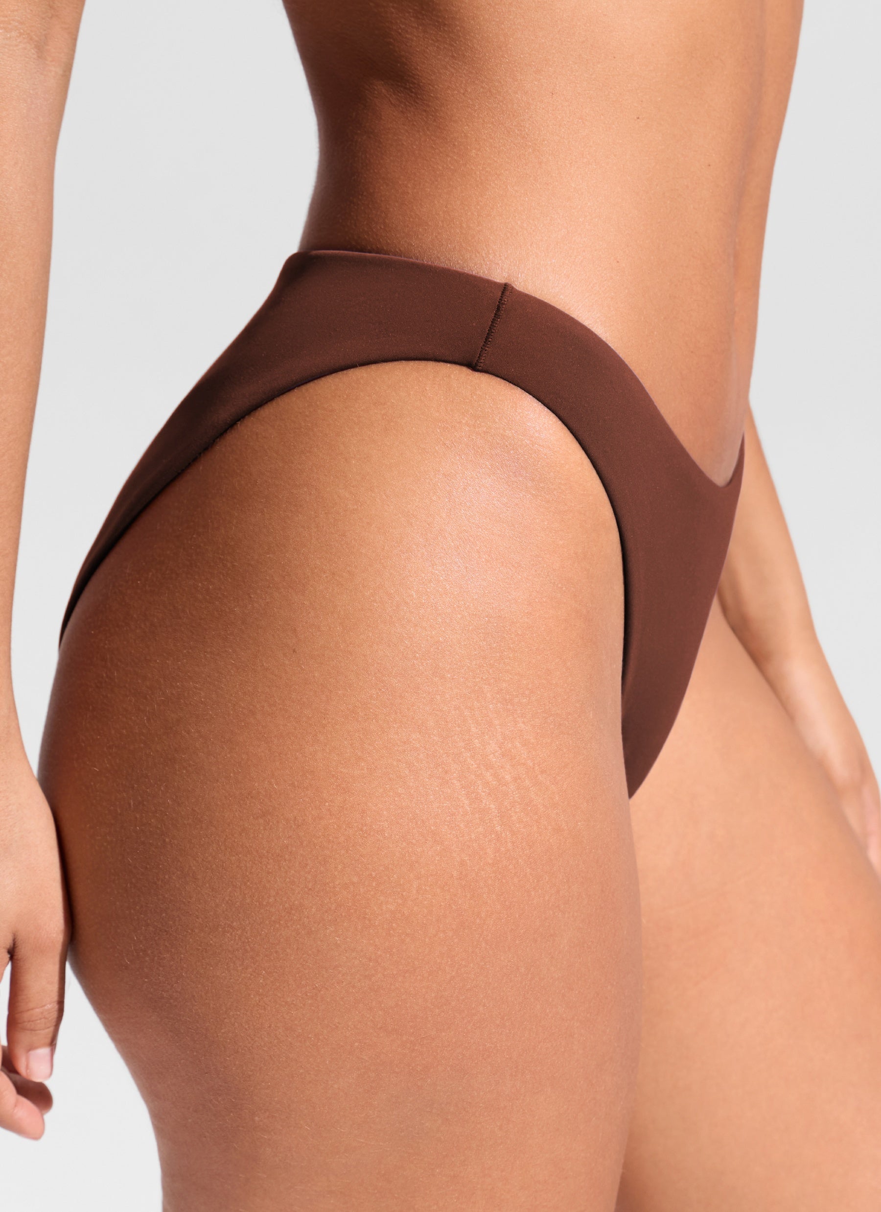CRZ YOGA Women's Nexfeel Double Lined Low Rise Cheeky Bikini Bottoms Lava Brown @model_info:T