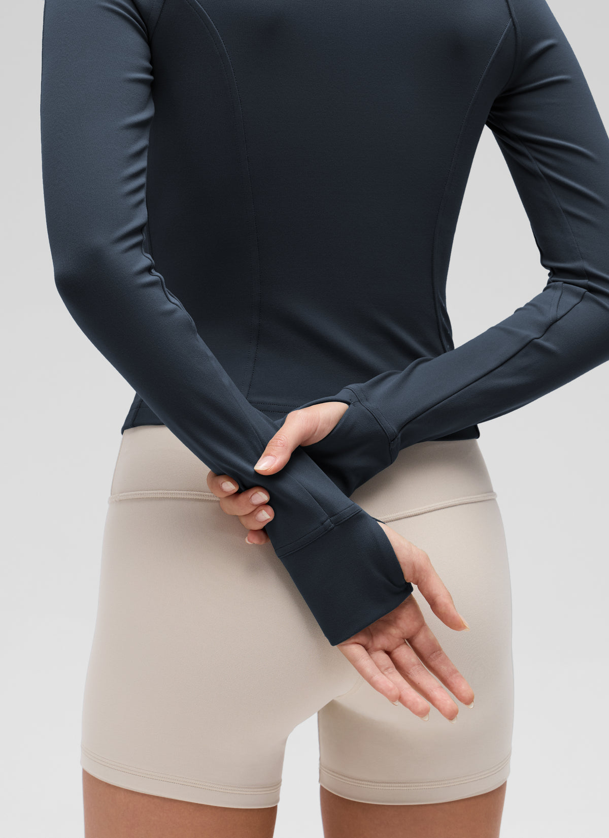 CRZ YOGA Women's Butterluxe Cropped Pocket Outerwear Full Zip Jackets True Navy @model_info:Anna
